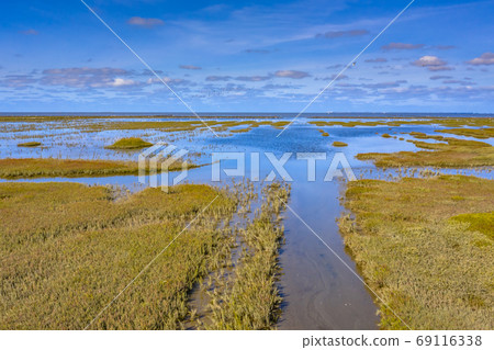 Aerial view Channel Tidal Marshland Waddensea 69116338