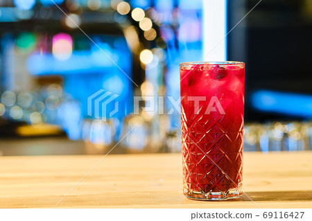 Cold cocktail gin and cherry 69116427