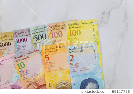 Banknote with different paper bills currency Venezuelan Bolivar 69117758