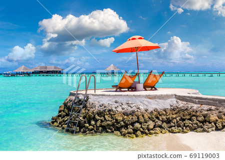 Sunbed and umbrella in the Maldives 69119003