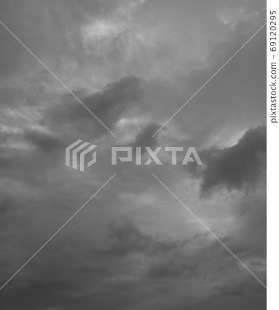 Cloudy gray sky background. Cloudscape, overcast grey clouds over horizon. 69120295