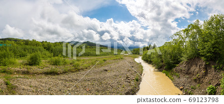 Dry river in summer day Dry river in summer day 69123798