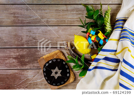 Jewish Symbols holiday of Sukkot in a synagogue Jewish Symbols holiday of Sukkot in a synagogue 69124199