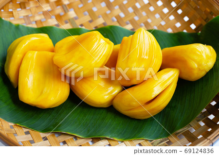 RiRipe Jackfruit on banana leaf in wooden bamboo threshing bask RiRipe Jackfruit on banana leaf in wooden bamboo threshing bask 69124836