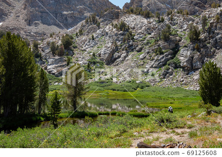 Photographer taking picture of the beautiful Dollar Lakes Photographer taking picture of the beautiful Dollar Lakes 69125608
