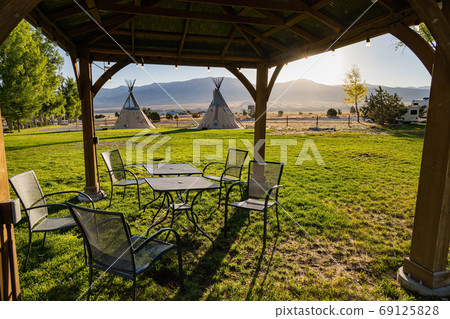Morning view of the Native American Indian Tents Teepee 69125828