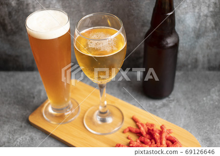View of beer served in two glasses 69126646