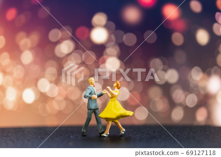 Miniature people , Couple dancing with bokeh background 69127118