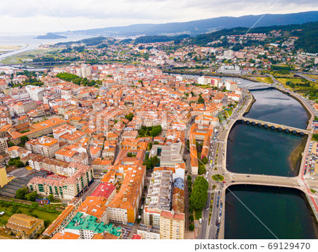 Pontevedra cityscape with a modern apartment buildings and sea bay 69129470