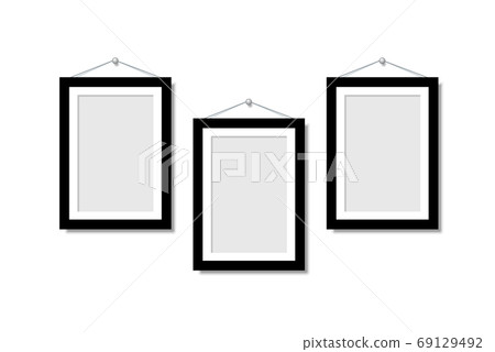 Set Empty frames for photos or pictures hanging on the wall. 69129492