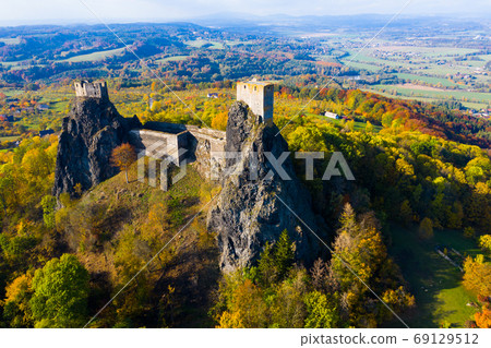 Medieval castle of Trosky on a hill in the forest. Czech Republic 69129512