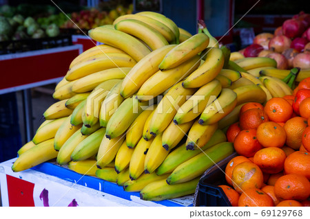 Closeup view on ripe bananas on the market Closeup view on ripe bananas on the market 69129768