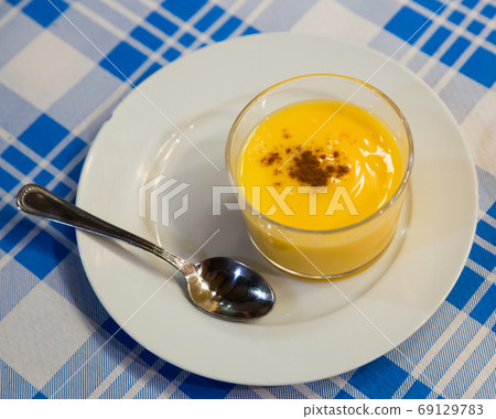 Natillas with cinnamon Natillas with cinnamon 69129783