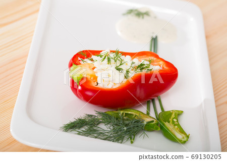 Photography of plate with pepper stuffed with brynza Photography of plate with pepper stuffed with brynza 69130205