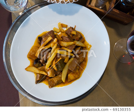 Veal stew with mushrooms Veal stew with mushrooms 69130355