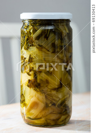 Closed mason jar with pickled chard Closed mason jar with pickled chard 69130413