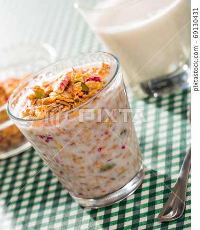 Oatmeal with dried fruit and milk Oatmeal with dried fruit and milk 69130431