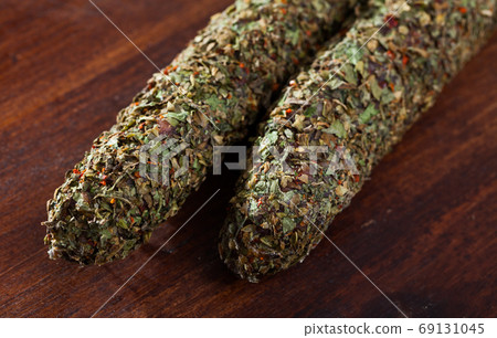 Catalan sausage fuet in herbs Catalan sausage fuet in herbs 69131045