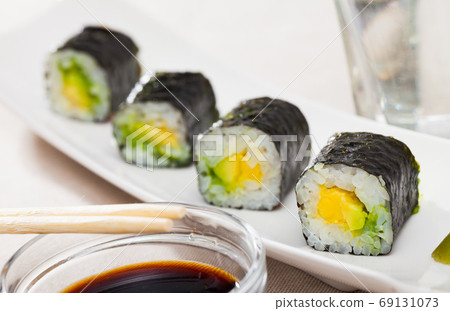 Appetizing Maki with avocado Appetizing Maki with avocado 69131073
