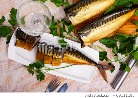 Smoked scomber with fresh parsley Smoked scomber with fresh parsley 69131195