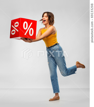 happy smiling young woman with sale sign happy smiling young woman with sale sign 69133208