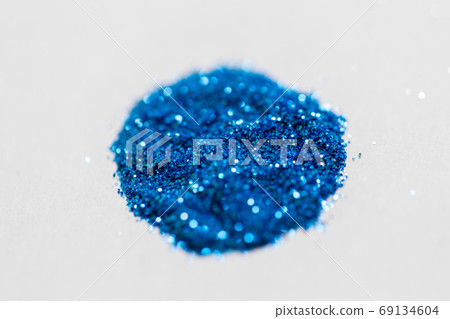blue glitters on white background blue glitters on white background 69134604
