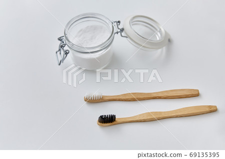 washing soda and wooden toothbrushes 69135395