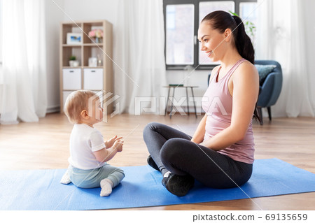 happy mother with little baby at home happy mother with little baby at home 69135659