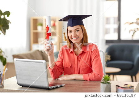 student woman with laptop and diploma at home student woman with laptop and diploma at home 69136197