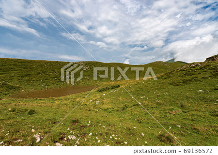 Monte Baldo - Green Meadows and small pond - Ridge of Naole Monte Baldo - Green Meadows and small pond - Ridge of Naole 69136572