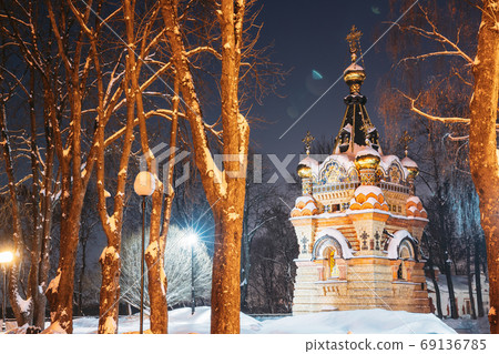 Gomel, Belarus. City Park In Winter Night. Chapel-tomb Of Paskevich (1870-1889 Years) In City Park. Rumyantsevs And Paskeviches Park. Famous Local Landmark In Snow Gomel, Belarus. City Park In Winter Night. Chapel-tomb Of Paskevich (1870-1889 Years) In City Park. Rumyantsevs And Paskeviches Park. Famous Local Landmark In Snow 69136785