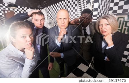 Portrait of thoughtful men and women Portrait of thoughtful men and women 69137670