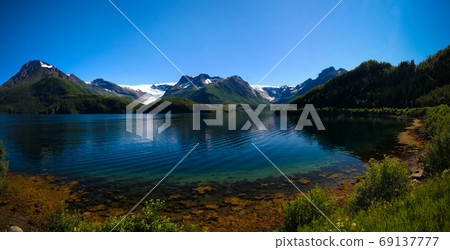 Panorama view to Holandsfjorden , Nordfjorden and Svartisen glacier, Meloy, Norway Panorama view to Holandsfjorden , Nordfjorden and Svartisen glacier, Meloy, Norway 69137777