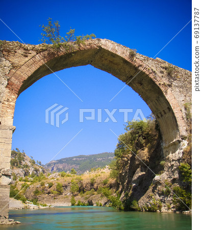 Panorama view to old ruined bridge over Dalaman river, Turkey 69137787