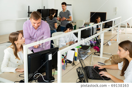 Working process in modern office 69138163