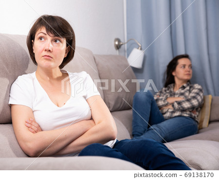 Home quarrel between friends woman 69138170