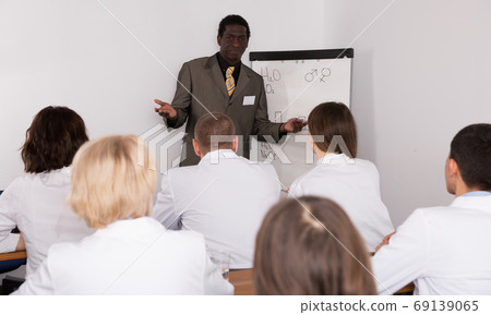 African American male giving presentation for medics 69139065