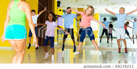 Active young children posing at dance class 69139221