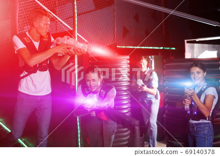 Pretty young girls took aim with laser guns 69140378