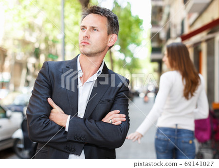 Annoyed guy after quarrel Annoyed guy after quarrel 69141027