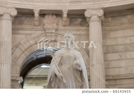 Queen Victoria statue inside Victoria memorial in Kolkata. Queen Victoria statue inside Victoria memorial in Kolkata. 69143935