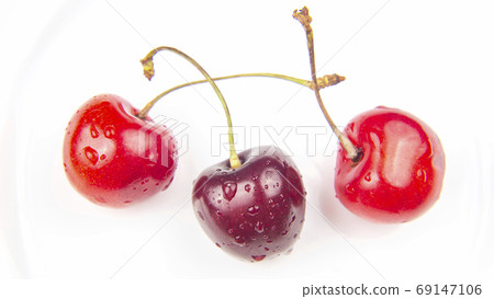 juicy cherry berry on a white background. fruits and vitamins. h juicy cherry berry on a white background. fruits and vitamins. h 69147106