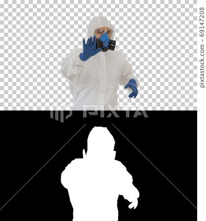 The doctor is dancing in a protective suit against the virus, Al The doctor is dancing in a protective suit against the virus, Al 69147208