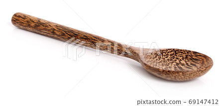 Wooden spoon on white background Wooden spoon on white background 69147412