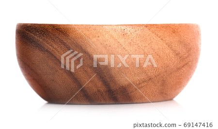Wooden bowl on white background Wooden bowl on white background 69147416
