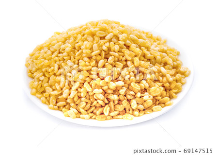 split Moong daal on white background split Moong daal on white background 69147515