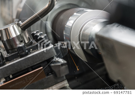 Metalworking lathe milling machine. Cutting metal modern processing technology. Milling is the process of machining using rotary cutters to remove material by advancing a cutter in workpiece. Metalworking lathe milling machine. Cutting metal modern processing technology. Milling is the process of machining using rotary cutters to remove material by advancing a cutter in workpiece. 69147781