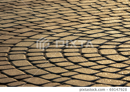the pavement close up in the sunlight 69147928