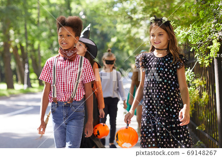 Children celebrating Halloween Children celebrating Halloween 69148267