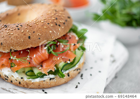 bagel with salted salmon, cucumber and cream cheese bagel with salted salmon, cucumber and cream cheese 69148464